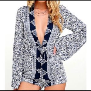 Lulu’s Many Moons Ivory & Navy romper
